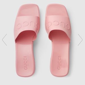 Gucci pink rubber sandals.
